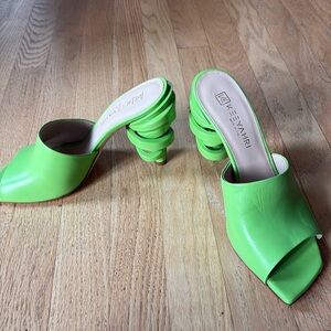 Keeyahri square toe mules with twisted heel details